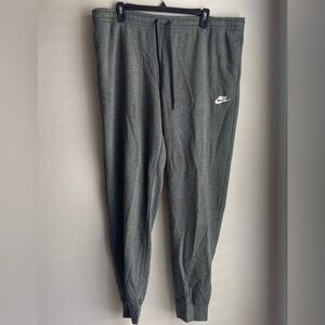 standard fit, mid rise, nike sweat pants. Never worn, tags attached.